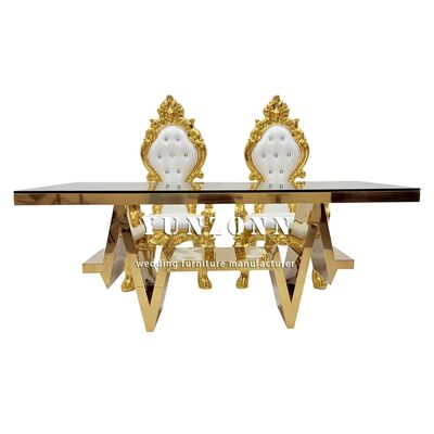 سعر جيد تجار الجملة أثاث الأعشاب الخبيثة الطاولة الحديثة الفاخرة الذهبية الفولاذ المقاوم للصدأ الزجاج طاولة طعام 6 مجموعات الكراسي الانترنت