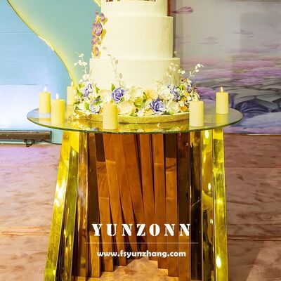 سعر جيد طاولة كعكة الزفاف الزجاجية البيضاء مع قاعدة العش الذهبية المستديرة من الفولاذ المقاوم للصدأ للأثاث الفندقية الانترنت