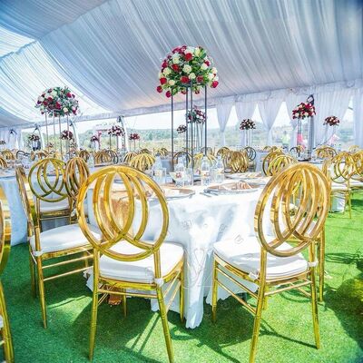 سعر جيد كرسي طعام حديث من الفولاذ المقاوم للصدأ للشقة الفندق حفلات الزفاف غرفة المعيشة في الهواء الطلق المطبخ استخدام الجملة الأثاث المعدني الانترنت